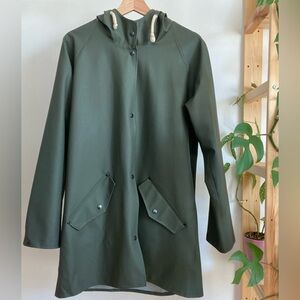 Minimalist Danish army green knee-length rain jacket